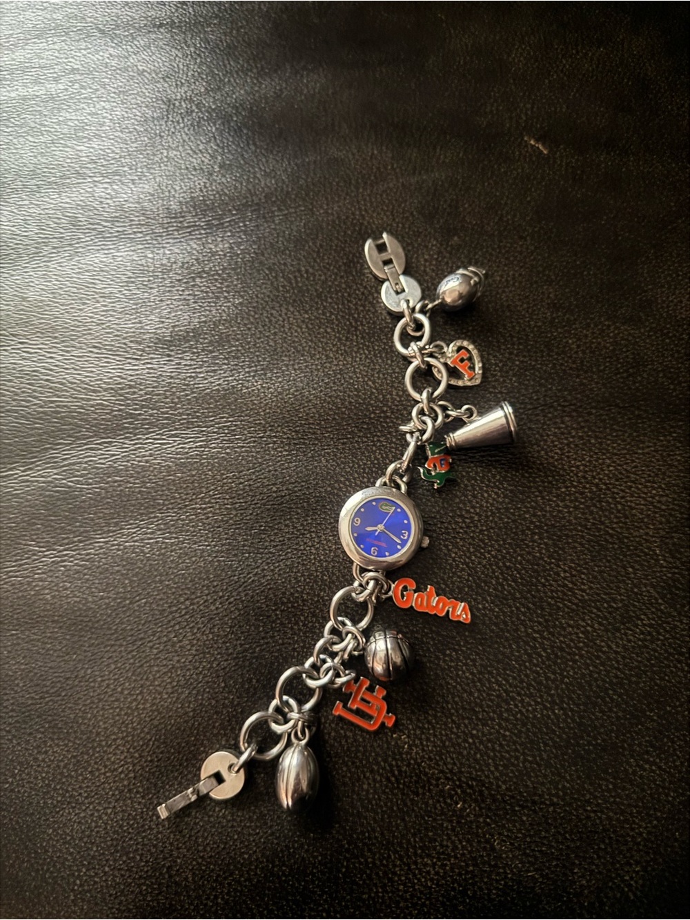 Fossil Silver Charm Bracelet Watch with Blue Dial and Orange Accents